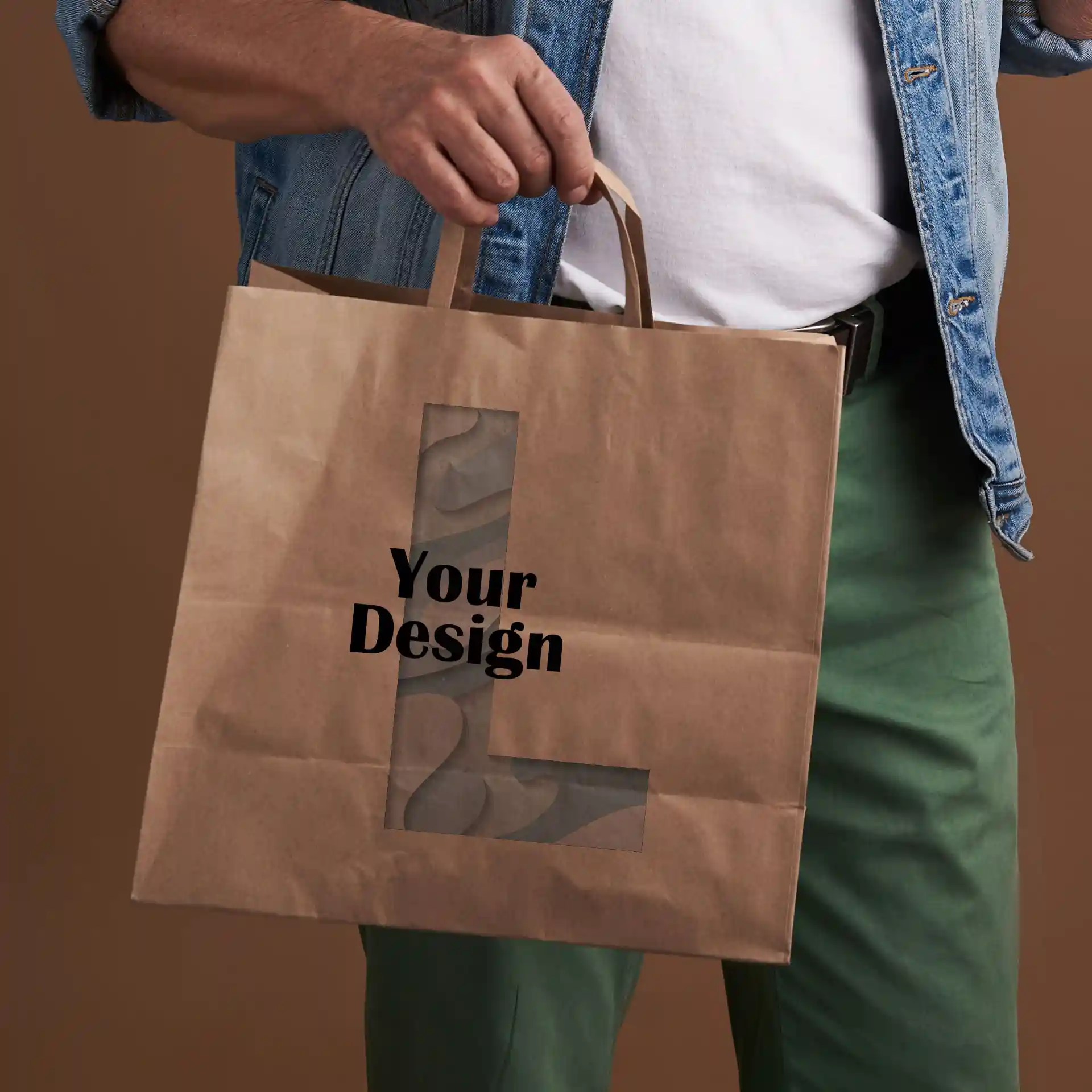 Brown paper carrier bag with a rectangular shape, featuring a transparent window and text design.