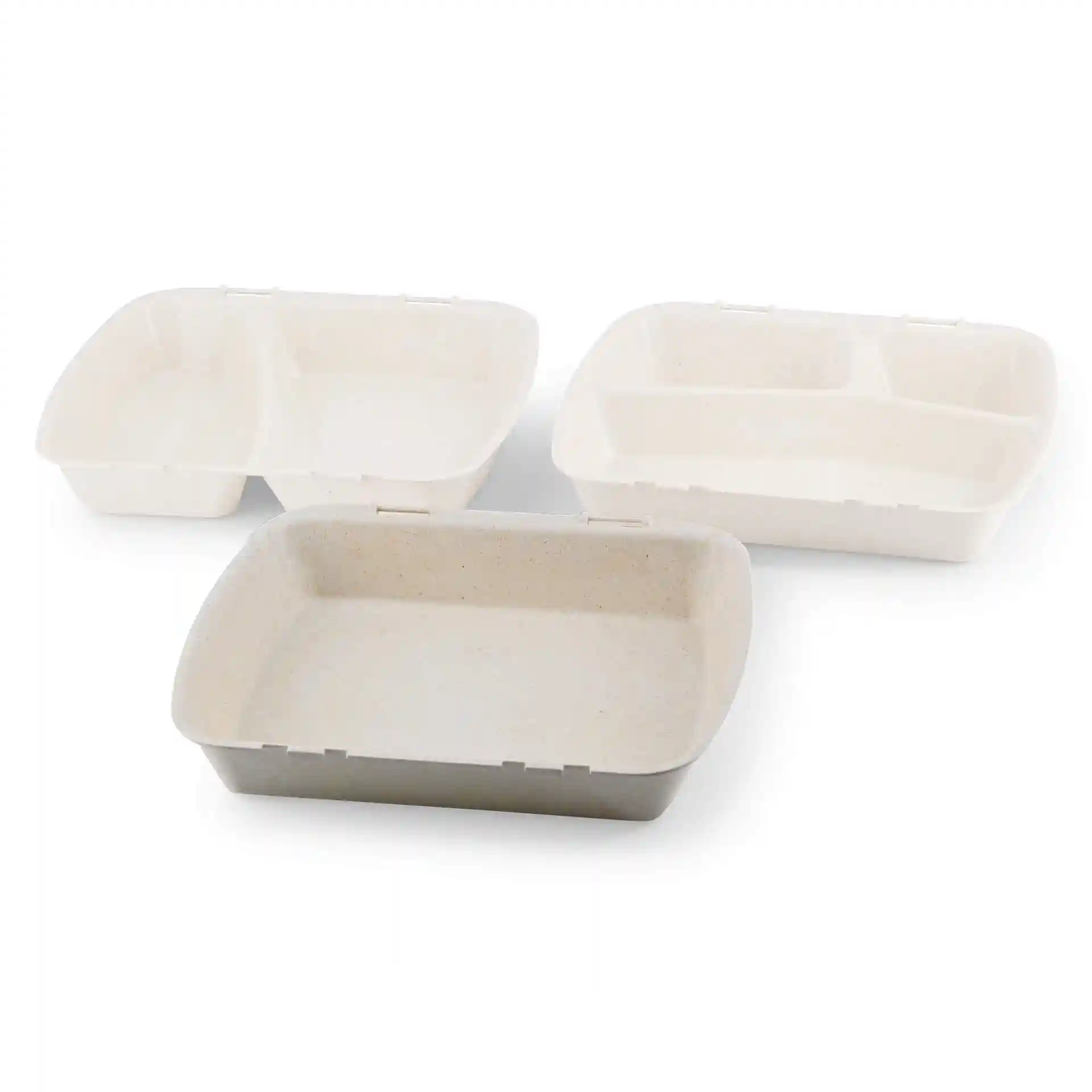 Three rectangular reusable containers in creamy white, featuring one with a divider, made from bio compound material.