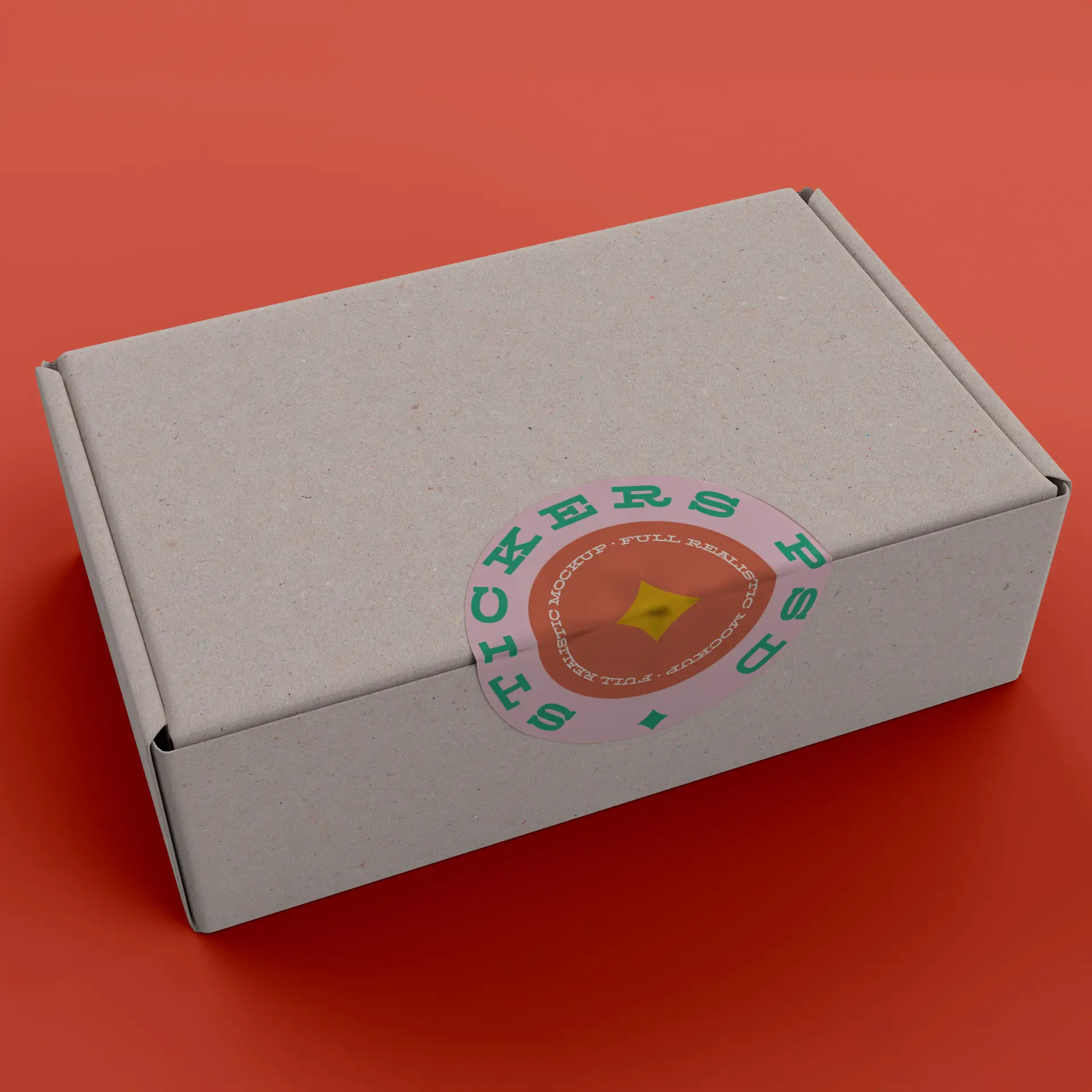 Round custom printed label on a kraft paper box, with a green and pink design, placed on a red surface.