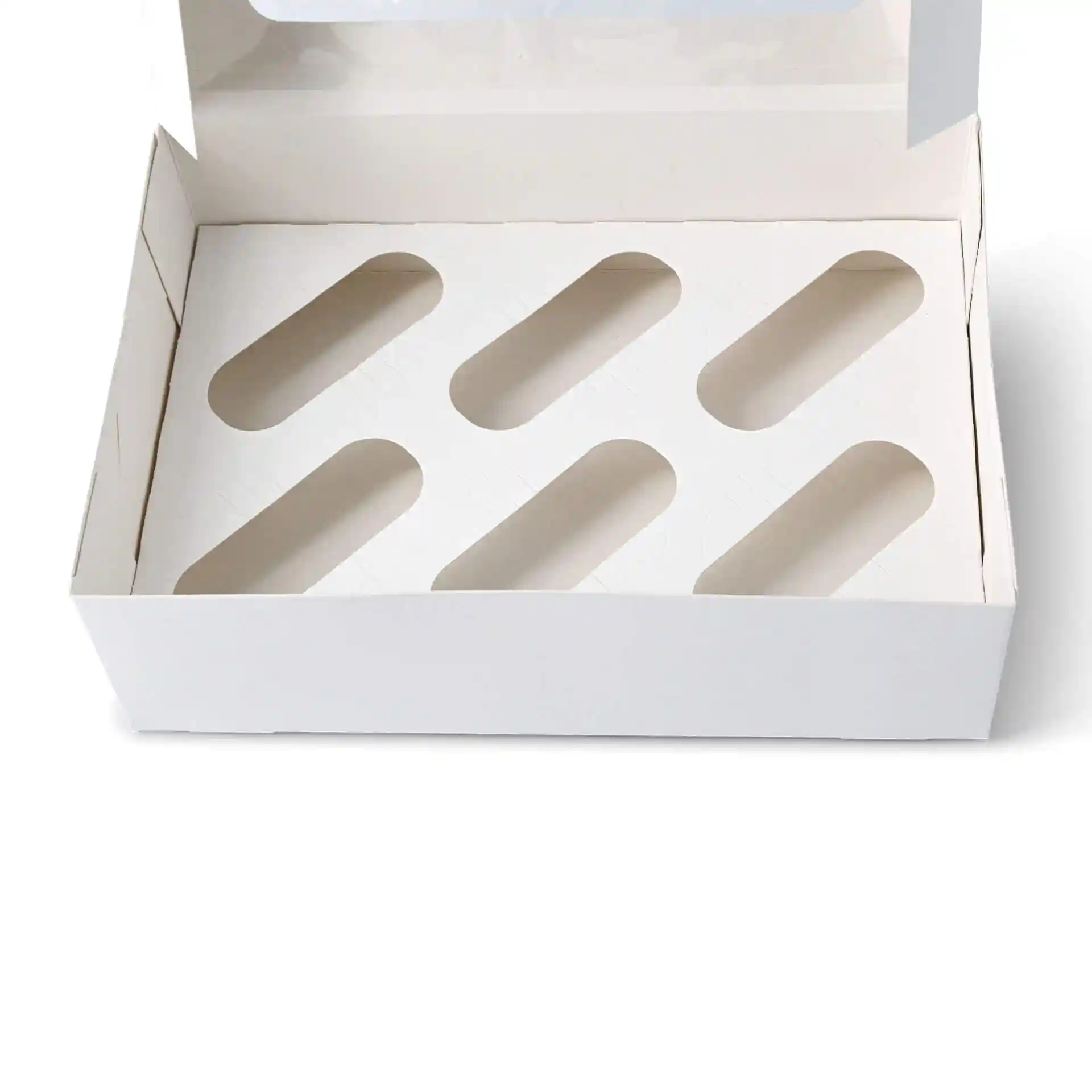 Leere Cupcake-Box-Einlage mit sechs ovalen Ausschnitten auf einer cremeweißen Pappe.