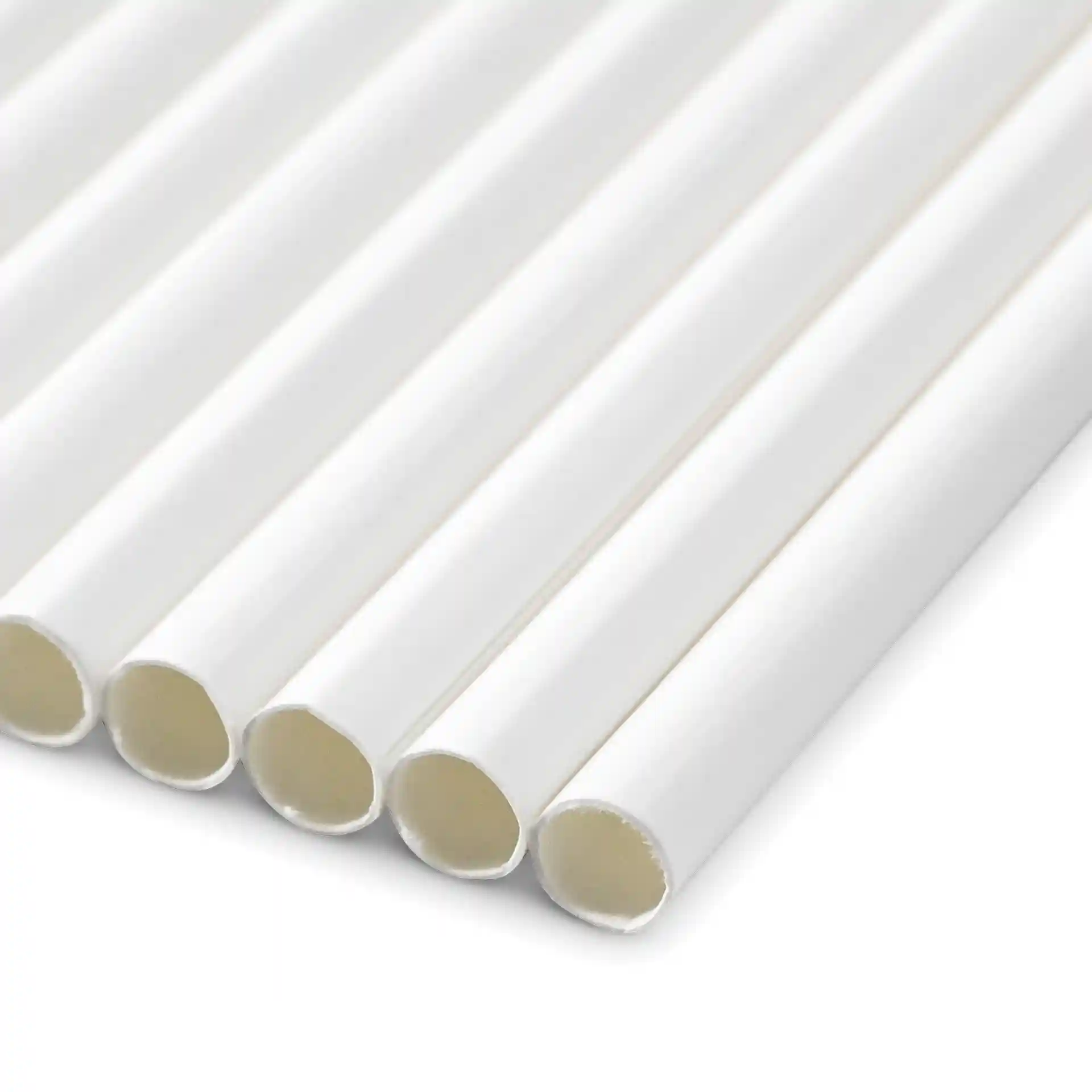 White paper jumbo drinking straws, 23 cm long and 0.8 cm in diameter, arranged in a row.