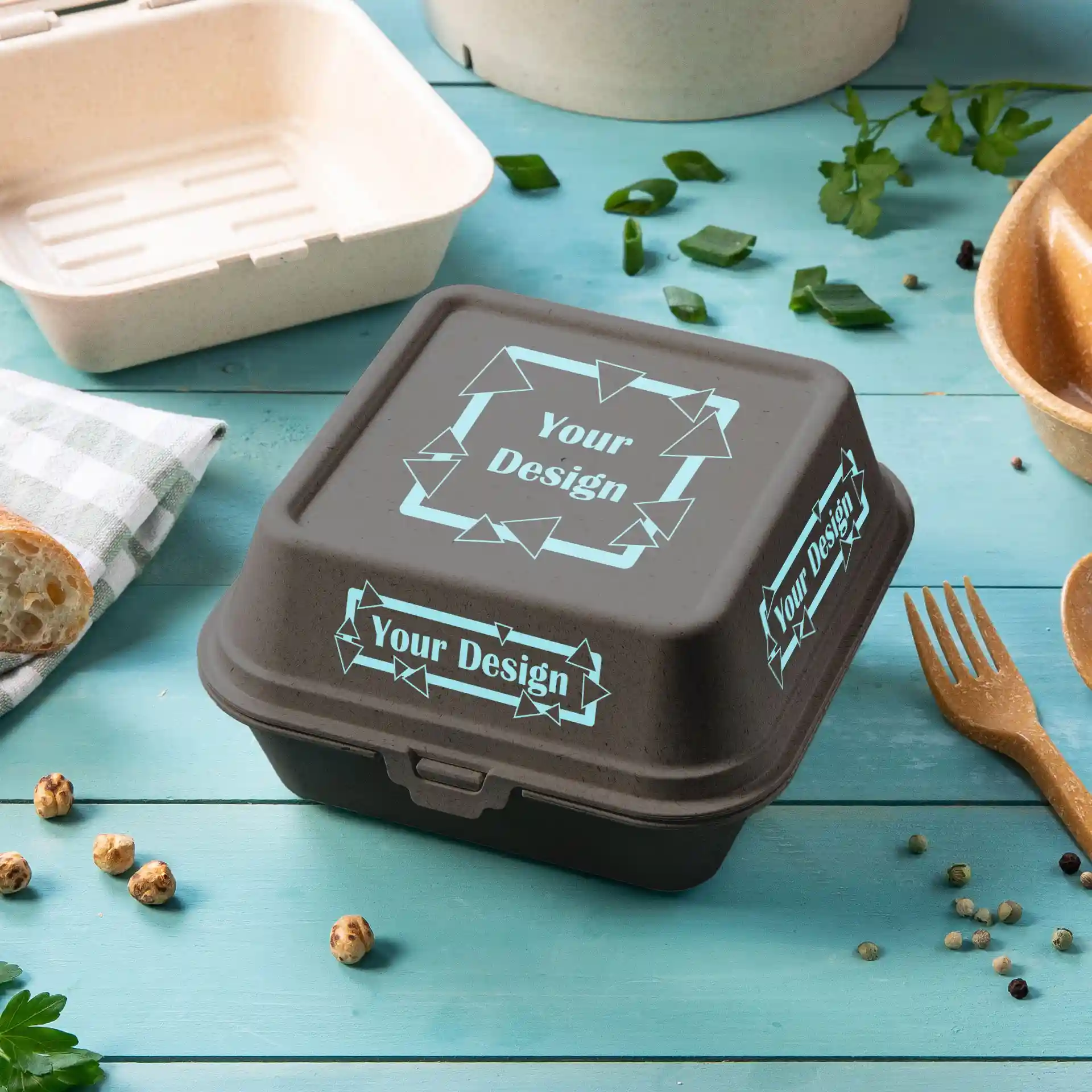 Grau rechteckige bedruckte wiederverwendbare Burgerbox mit Deckel, mit einem Design auf der Oberseite.