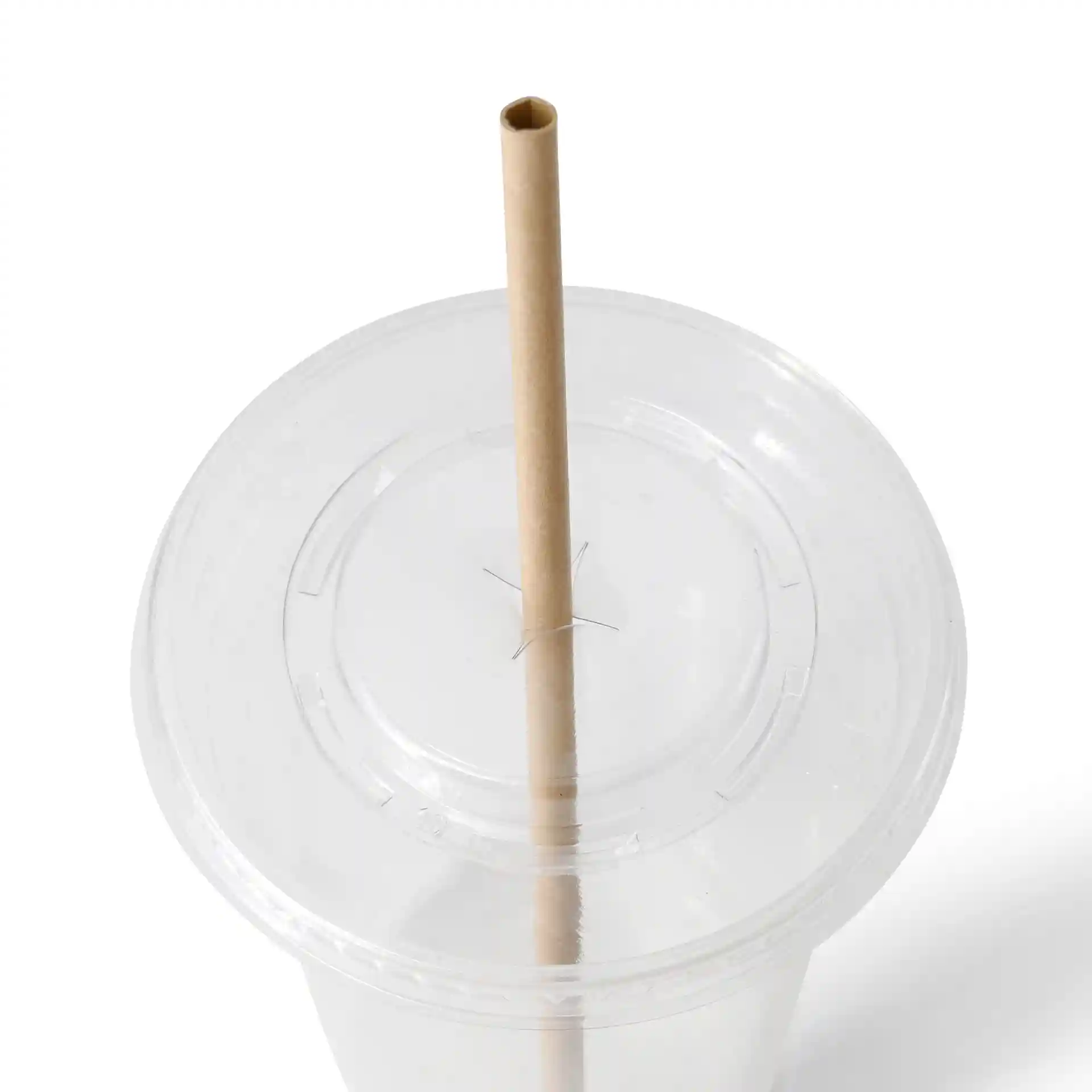 Image of a clear cup lid with a hole for a brown paper straw inserted vertically.